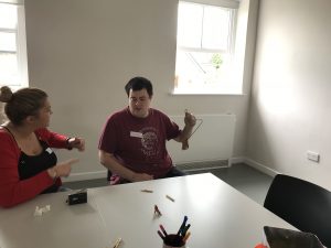 Pear Tree Learning Club - Jamie experiments with a coat hanger and pegs