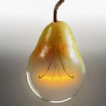 a light bulb and pear merged